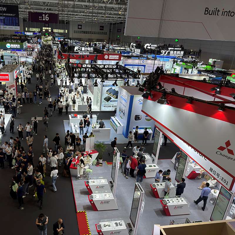 Hongyian team visiting supplier booths at Shenzhen AI Electronics Expo August 2026